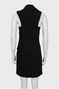 Dress with contrasting inserts and tag