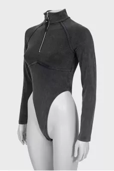 Bodysuit with raised seams and tag