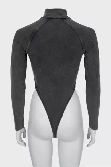 Bodysuit with raised seams and tag