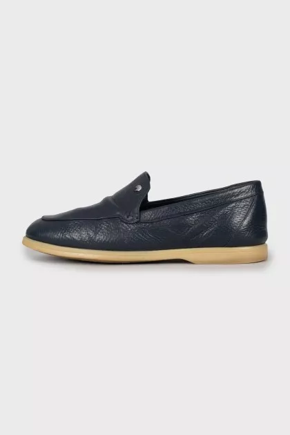 Men's blue loafers with perforations