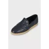 Men's blue loafers with perforations