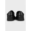 Men's black leather sneakers