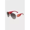 Sunglasses with red temples