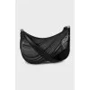 Bag with embossed pattern and tag