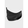 Bag with embossed pattern and tag