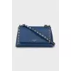 Crossbody bag decorated with studs