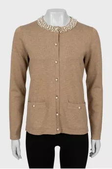 Knitted cardigan decorated with beads