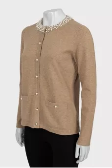 Knitted cardigan decorated with beads