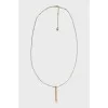 Yellow gold capsule pendant