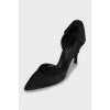 Shoes decorated with a bow and rhinestones