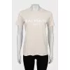 Beige T-shirt with brand logo