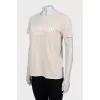 Beige T-shirt with brand logo