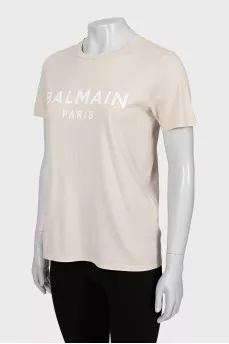 Beige T-shirt with brand logo
