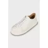 White sneakers with chunky soles