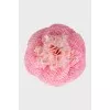 Knitted brooch in the shape of a flower
