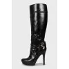 Black leather boots with heels