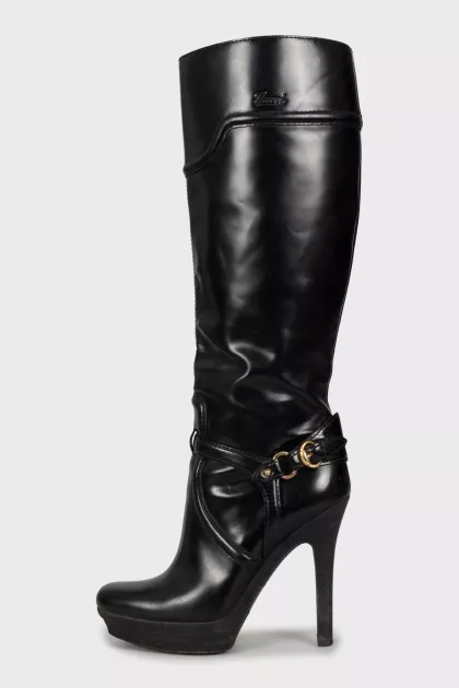 Black leather boots with heels