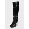 Black leather boots with heels