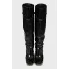 Black leather boots with heels