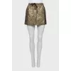 Golden printed mini skirt