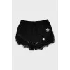 Sports shorts decorated with lace