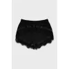 Sports shorts decorated with lace