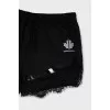 Sports shorts decorated with lace