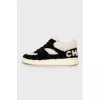 Black and white fur and leather sneakers