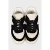 Black and white fur and leather sneakers