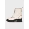 Leather boots with contrast stitching