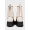 Leather boots with contrast stitching