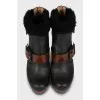 Leather ankle boots decorated with fur