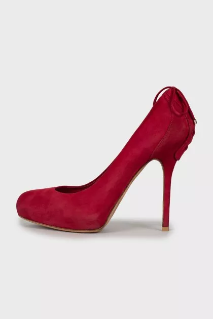Suede shoes decorated with laces
