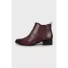 Burgundy leather and suede boots