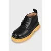 Leather boots with textured soles