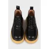 Leather boots with textured soles