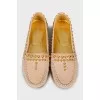 Leather moccasins with golden decoration