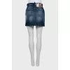 Distressed denim skirt