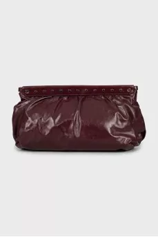 Leather clutch with silver decor