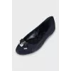 Suede ballet shoes decorated with bows