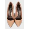 Beige patent leather pointed toe pumps