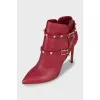 Leather ankle boots with gold studs