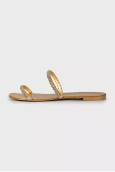 Golden slides decorated with rhinestones
