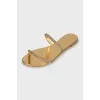 Golden slides decorated with rhinestones