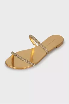 Golden slides decorated with rhinestones