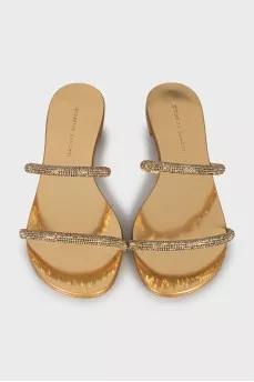 Golden slides decorated with rhinestones