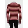 Striped sweater decorated with embroidery