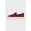 Leather slip-ons with tag