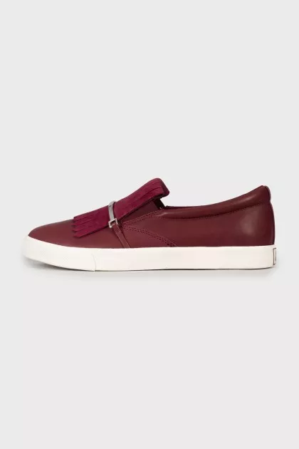 Leather slip-ons with tag