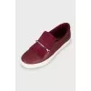 Leather slip-ons with tag